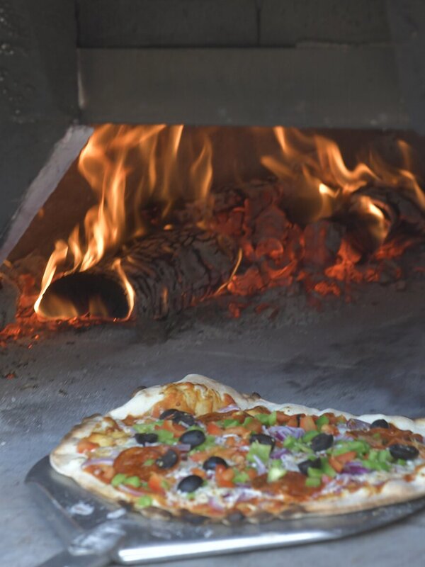 Pizza in de houtoven